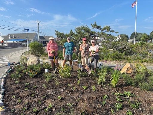 Volunteers planting the Corner Garden in 2025